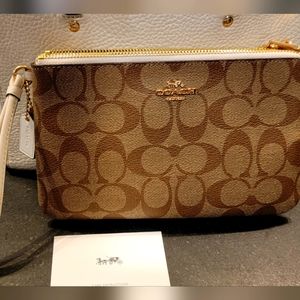 coach wristlet brown and ivory